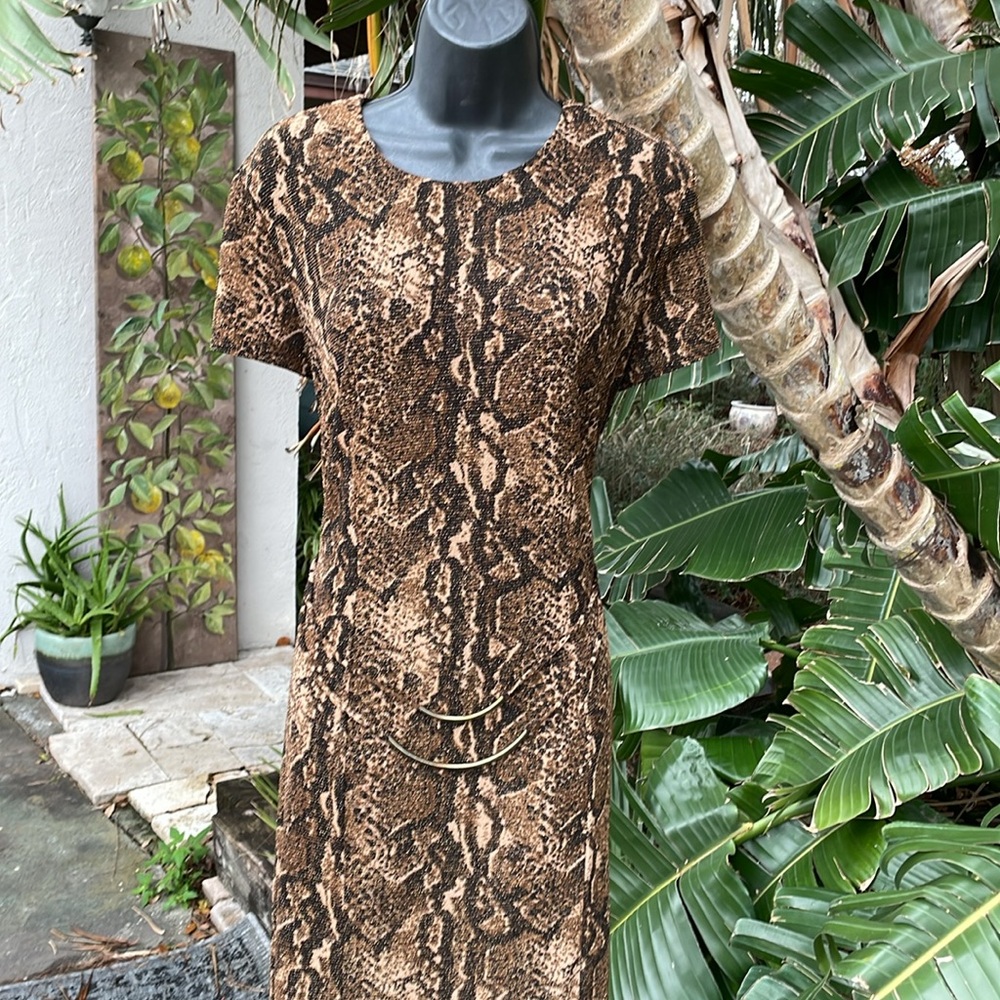 Scarlet snake print Maxi with a drop waist in front slit
